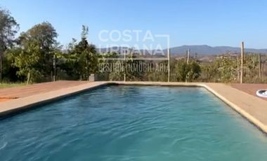 Parcela con casa en Tabolango