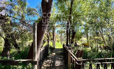 Parcela con casa en Tabolango