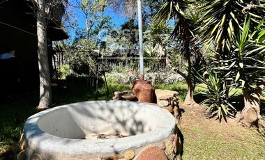Parcela con casa en Tabolango