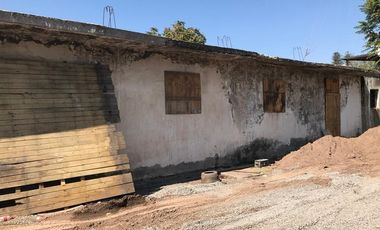 OPORTUNIDAD TERRENO CON PROPIEDADES COMERCIALES