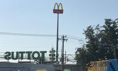 OPORTUNIDAD TERRENO CON PROPIEDADES COMERCIALES