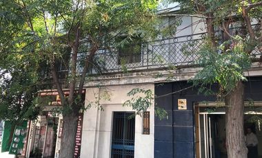 OPORTUNIDAD TERRENO CON PROPIEDADES COMERCIALES