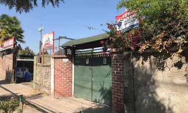 OPORTUNIDAD TERRENO CON PROPIEDADES COMERCIALES