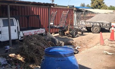 OPORTUNIDAD TERRENO CON PROPIEDADES COMERCIALES