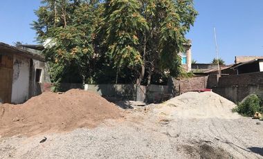 OPORTUNIDAD TERRENO CON PROPIEDADES COMERCIALES