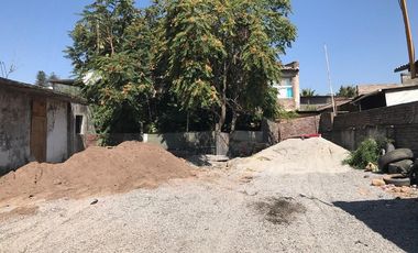 OPORTUNIDAD TERRENO CON PROPIEDADES COMERCIALES