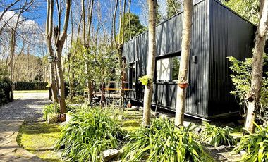 Dos casas en el bosque de Mar de Cobo