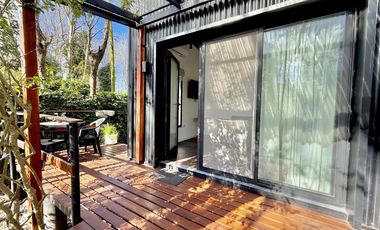 Dos casas en el bosque de Mar de Cobo