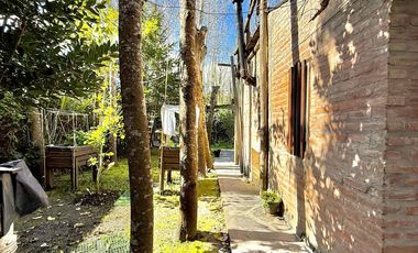 Dos casas en el bosque de Mar de Cobo