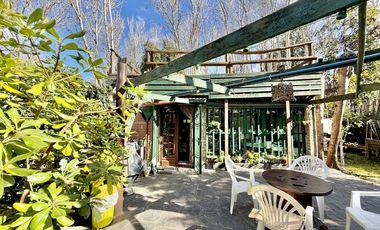 Dos casas en el bosque de Mar de Cobo