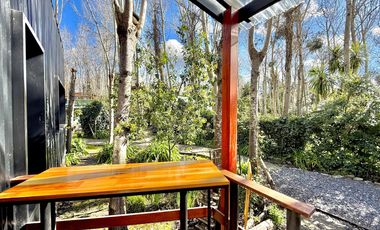 Dos casas en el bosque de Mar de Cobo