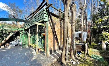 Dos casas en el bosque de Mar de Cobo