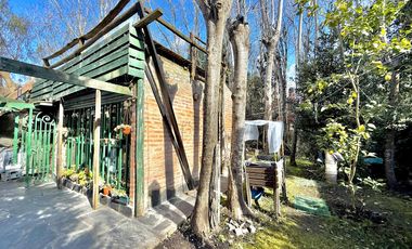 Dos casas en el bosque de Mar de Cobo