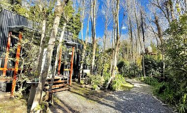 Dos casas en el bosque de Mar de Cobo