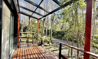 Dos casas en el bosque de Mar de Cobo