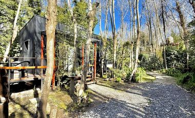 Dos casas en el bosque de Mar de Cobo