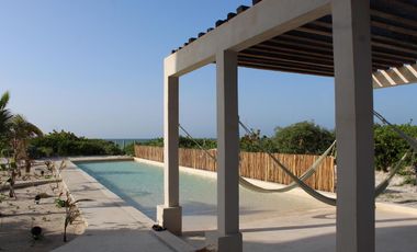 DEPARTAMENTO EN VENTA MERIDA, PLAYA TELCHAC, TEMPORADA, FRENTE AL MAR, LISTA.