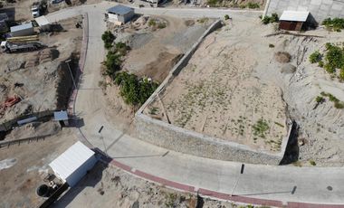 Terreno frete a playa tejon