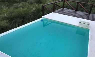 AT108. CUESTA BLANCA. HERMOSA CASA CON PILETA Y GRAN VISTA (2 PAX)