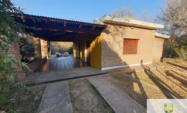 Casa en alquiler temporario de 2 dormitorios c/ cochera en Mina Clavero