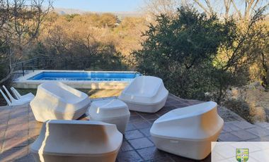 Casa en alquiler temporario de 2 dormitorios c/ cochera en Mina Clavero