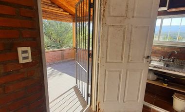 Venta de casa de 2 dormitorios c/ cochera en Villa Cura Brochero K036CB