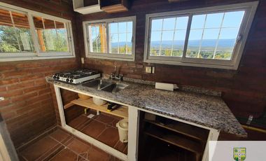 Venta de casa de 2 dormitorios c/ cochera en Villa Cura Brochero K036CB