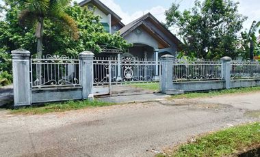 Rumah pinggir Jl. Rawa Bening RT 01. Pekanbaru.