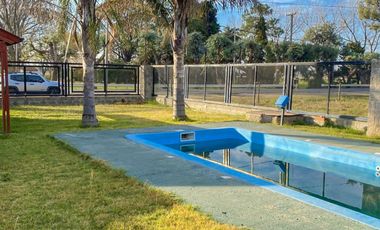 VENTA CASA SOBRE RUTA  IBARLUCEA. PISCINA. U$S105.000 OPORTUNIDAD