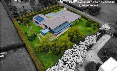 Venta casa campestre Antioquia oriente ceja parcelación luxury lujo unidad cerrada vigilancia lago quebradita páneles solares acabados lujosos