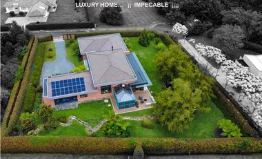 Venta casa campestre Antioquia oriente ceja parcelación luxury lujo unidad cerrada vigilancia lago quebradita páneles solares acabados lujosos