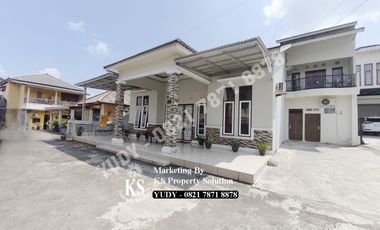 Rumah di jalan Demang Lebar Daun Tanah Luas di Kota Palembang