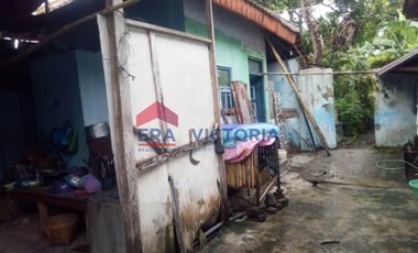 Rumah + Sawah DIJUAL terletak di jalan raya