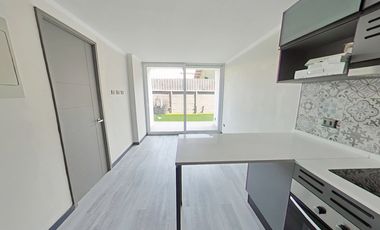 Departamento un Dormitorio con Jardin