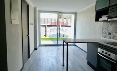 Departamento un Dormitorio con Jardin