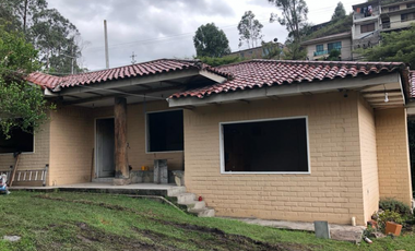 Terreno y casa x terminar, panamericana N y camino a Paccha Cuenca