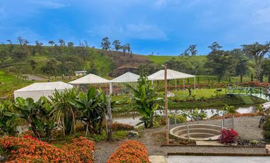 Finca en Venta Baeza provincia Napo 7 Hectáreas con 3 Casas y Laguna privada