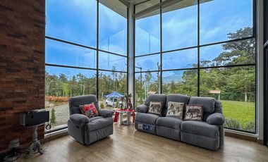 Finca en Venta Baeza provincia Napo 7 Hectáreas con 3 Casas y Laguna privada