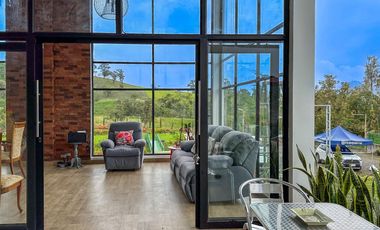 Finca en Venta Baeza provincia Napo 7 Hectáreas con 3 Casas y Laguna privada