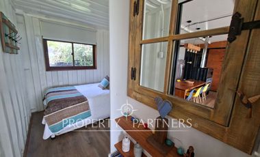 Linda casa con gran vista a orilla de lago