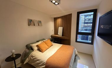 Departamento de 2 dormitorios con patio exclusivo, pileta y parrillero en construcción.