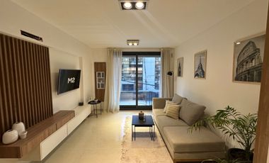 Departamento de 2 dormitorios con patio exclusivo, pileta y parrillero en construcción.