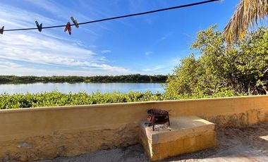 Disfruta de esta Casa en venta con vista a la laguna, flamingos y cerca de la playa  en Chabihau, Yucatan