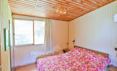 Exclusiva Parcela Frente al Mar con Playa Privada y Bahía Cristalina en Bahía Azul de Los Vilos.