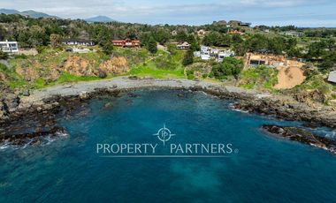 Exclusiva Parcela Frente al Mar con Playa Privada y Bahía Cristalina en Bahía Azul de Los Vilos.