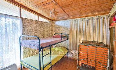 Exclusiva Parcela Frente al Mar con Playa Privada y Bahía Cristalina en Bahía Azul de Los Vilos.