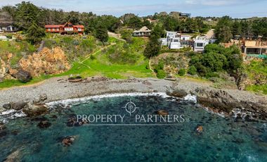 Exclusiva Parcela Frente al Mar con Playa Privada y Bahía Cristalina en Bahía Azul de Los Vilos.