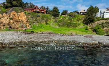 Exclusiva Parcela Frente al Mar con Playa Privada y Bahía Cristalina en Bahía Azul de Los Vilos.