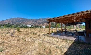 Parcela rebajada con casa en condominio consolidado