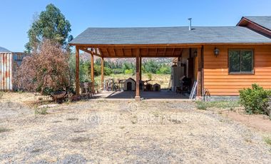 Parcela rebajada con casa en condominio consolidado